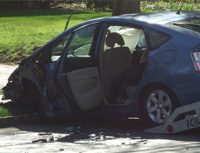 Poškozený automobil po havárii